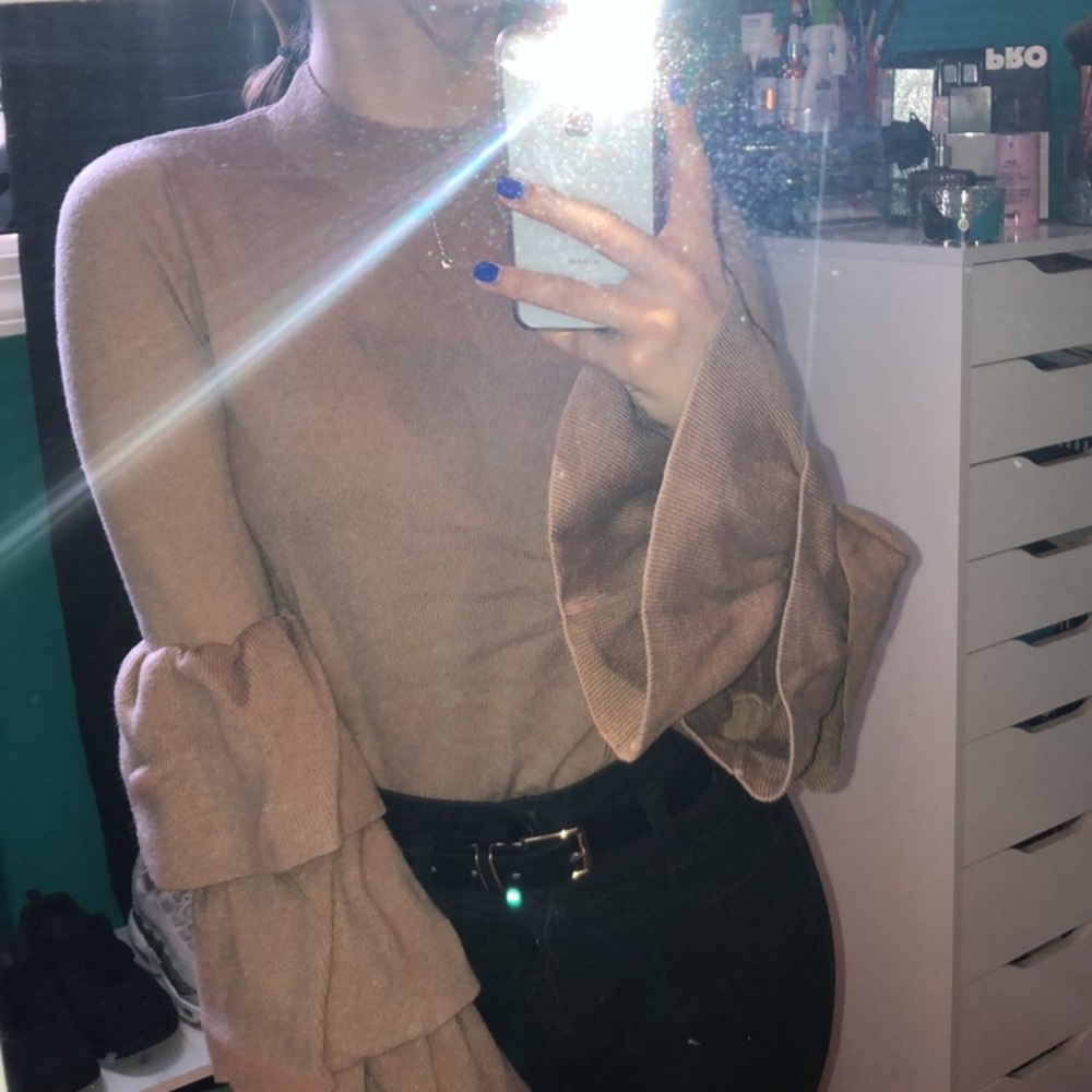 FashionNova’s Ruffle around sweater